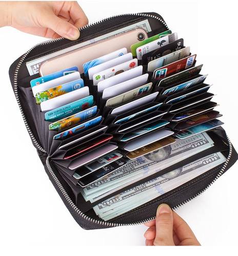 محفظه بسعة كبيره تكفي للجوال او الجواز وغيرهم مزودة بعازل حماية ضد سرقات البطاقات  