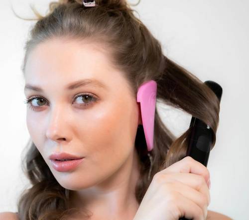   اداة من السيلكون لحماية الاذن من حرارة اجهزة الشعر