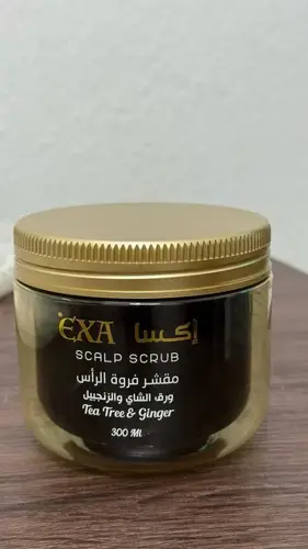 مقشر فروة الراس ورق الشاي والزنجبيل من ماركة اكسا - 300 مل