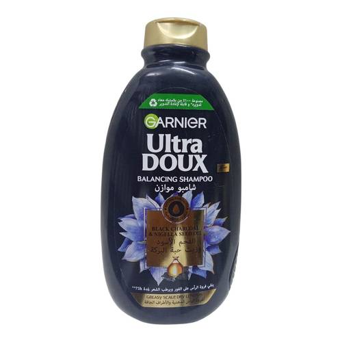 شامبو موازن بالفحم وزيت حبة البركة لفروة الرأس والاطراف الجافة من غارنييه - 600مل Garnier Oil Balancing Shampoo with Charcoal and Black Seed Oil for Dry Scalp and Ends - 600ml
