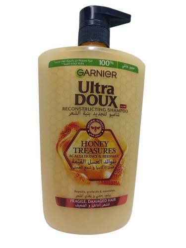 شامبو لتجديد بنية الشعر بعسل الاكاسيا وشمع العسل للشعر التالف والضعيف من غارنييه - 1000مل  Garnier Regenerist Shampoo with Acacia Honey and Beeswax for Damaged and Weak Hair - 1000ml