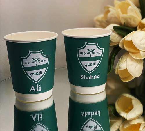 أكواب ورقية بشعار نادي الأهلي