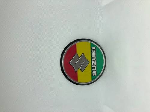 استكر مكينة سوزوكي (جامايكا) AX100 