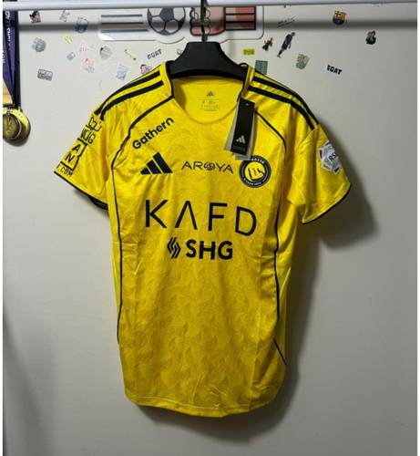 تشيرت نادي النصر الاصفر 2026