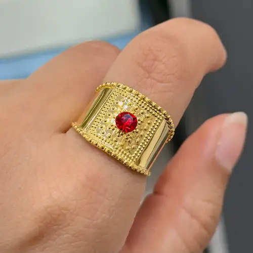 خاتم ذهب عيار21 شعبي تصميم مرتعشة فص أحمر 