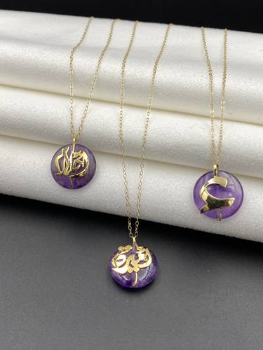 Gold necklace with natural amethyst stone