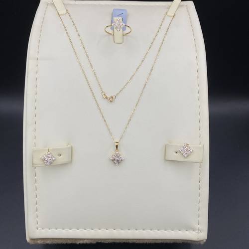 Half set in 18k gold with zircon and diamond design