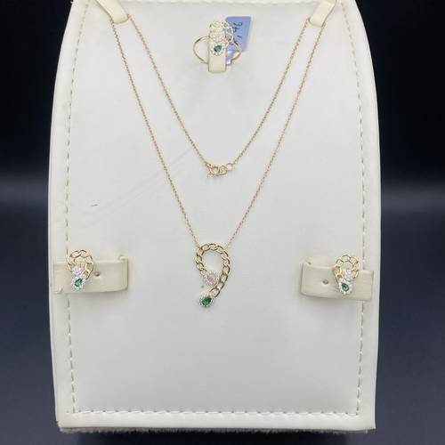 Half set in 18k gold with zircon and diamond design