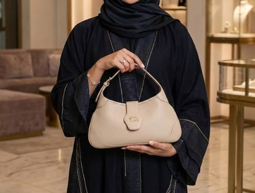 شنطة نسائية ايمزوري بلون أبيض