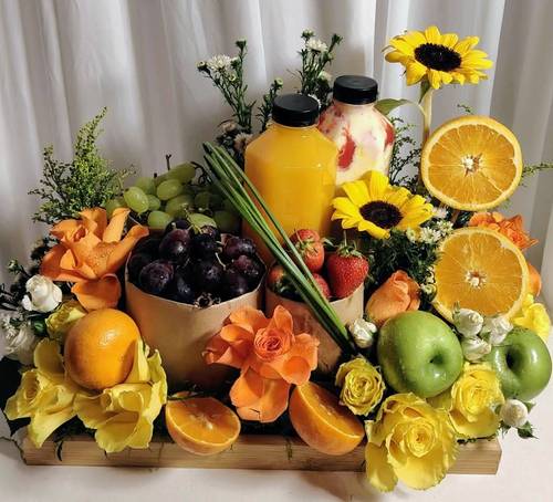 Fruit arrangement with flowers