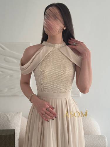 فستان الجميلة  - (XS) الخصر 24 انش : الصدر 30 انش
