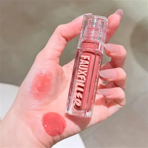 Huda Beauty Faux Filler ملمع شفاه لامع غير لزج مرطب كريستال واضح زيت الشفاه ممتلئ الجسم ترطيب ملون أحمر الشفاه ماكياج