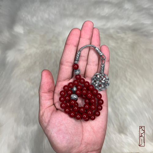 حجر احمر مع فضه 📿