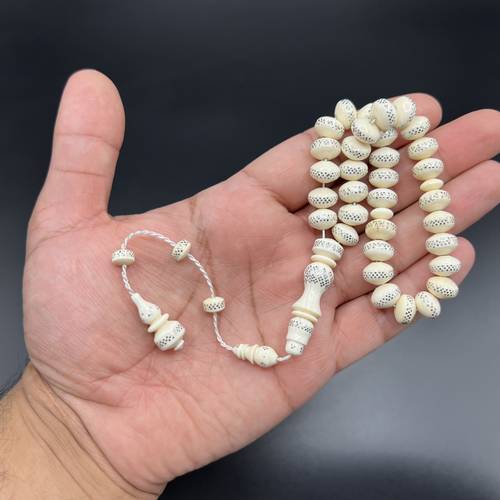 مسباح عاج ذروي 🐘📿