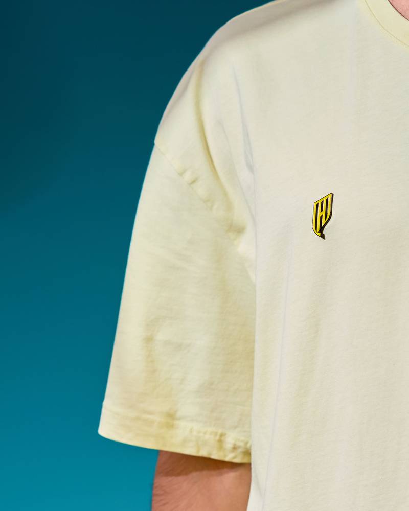 Crest pin yellow