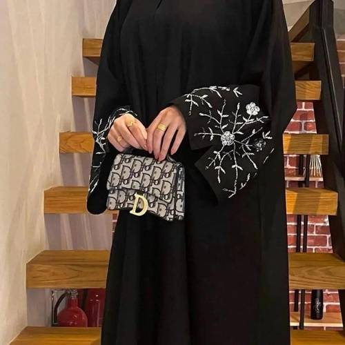 Tعباية شك 