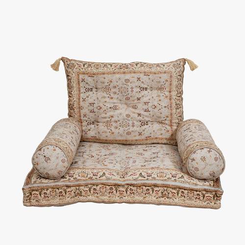 A small floor seat made of natural cotton