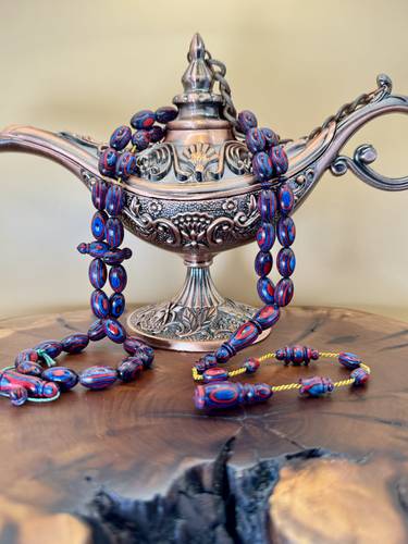 سبحة خشب مضغوط عيون ملتي كلر 