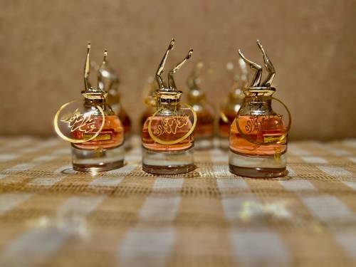 عطر مني 25مل توزيعات 12 حبه