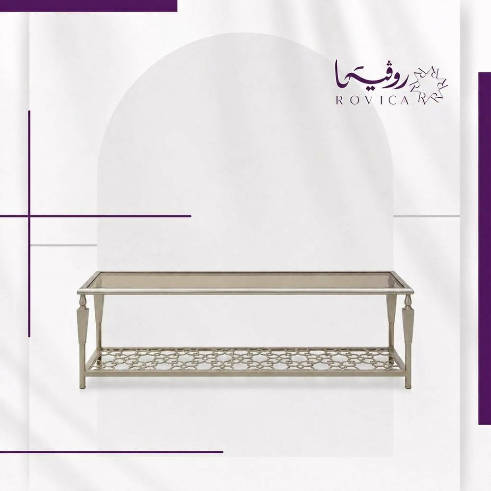 طاولة تلفزيون حديد وزجاج بيج مع رف سفلي مزخرف بخلفية بيضاء