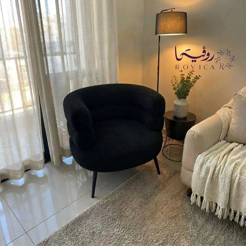 كرسي مفرد بوكلية لون أسود بتصميم دائري فاخر ومريح  Rovica